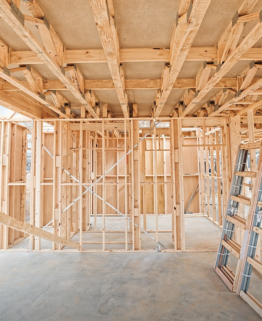 Framing inside a house under construction. The best beginning for any building, repair, or improvement project is finding a reliable contractor you can trust.